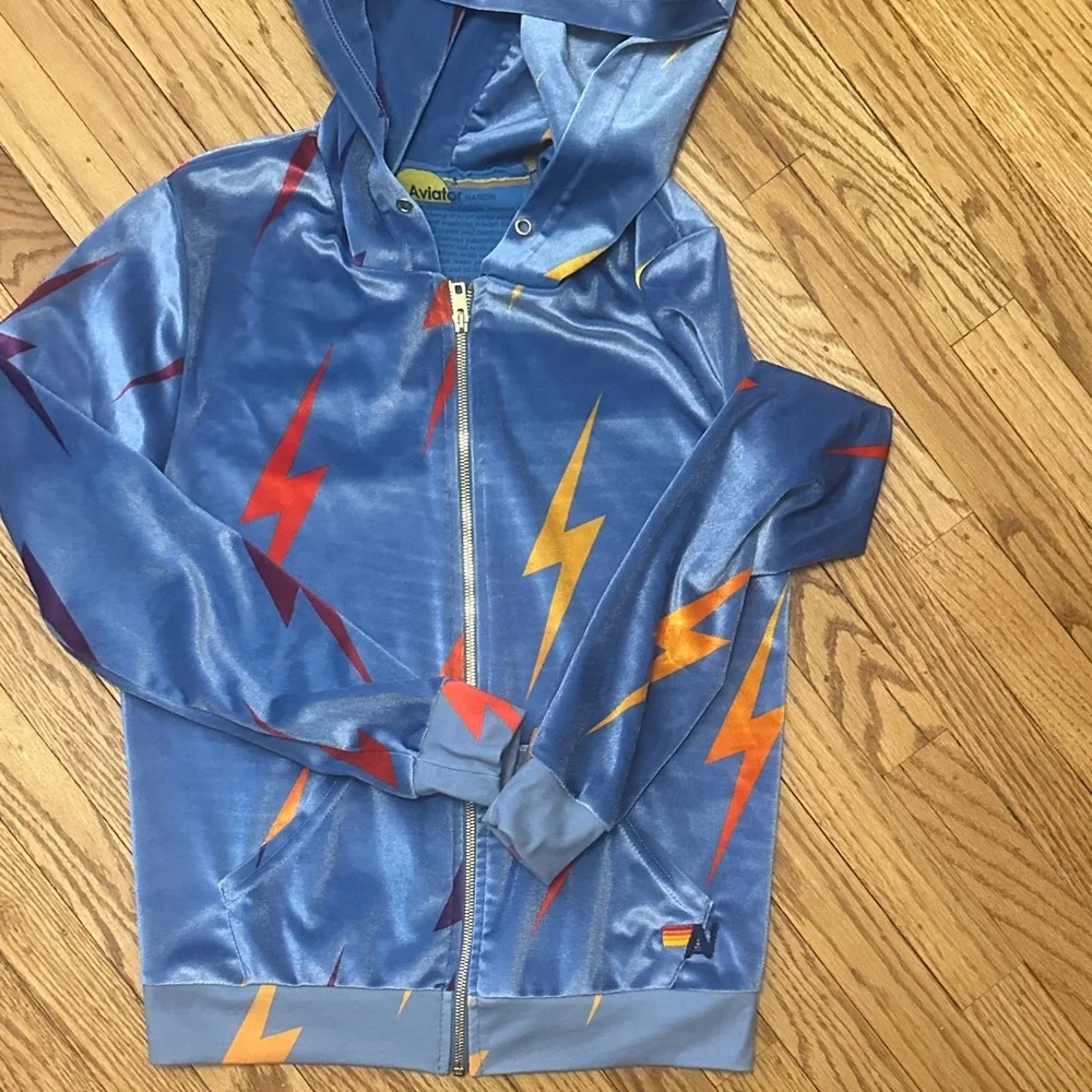 Aviator Nation Kids Light Blue Lightning Zip Hoodie with Orange & Red Bolts - Picture 1 of 3